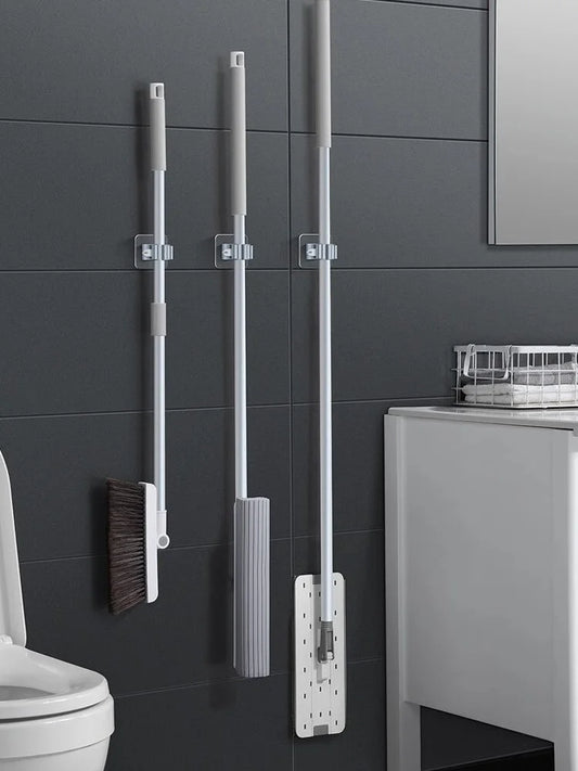 Self-Adhesive Mop Holder – Wall-Mounted Storage Rack